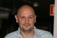 Ерленд Лу - фото