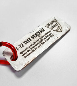 Charity Keychain From T-72 Tank Wreckage - фото книги